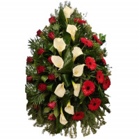 Red and white funeral wreath of gerberas, calla lilies and roses